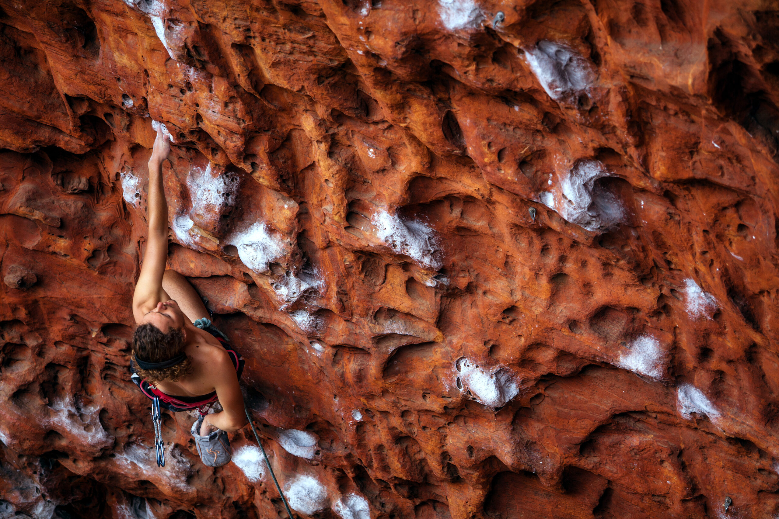 Rock climber on red sandstone